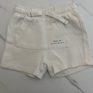 All white cotton toddler shorts